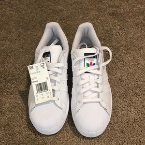 Ladies Adidas Superstars brand new never worn .